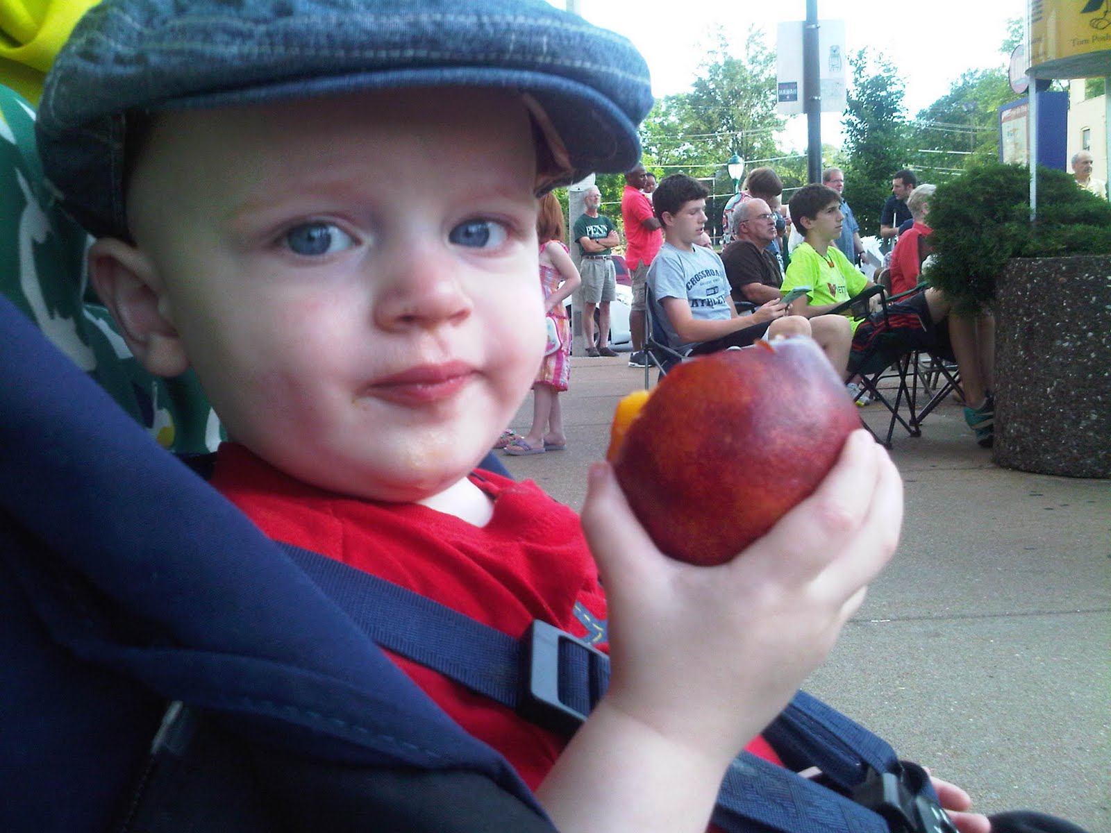Eating a peach at UCity Concert