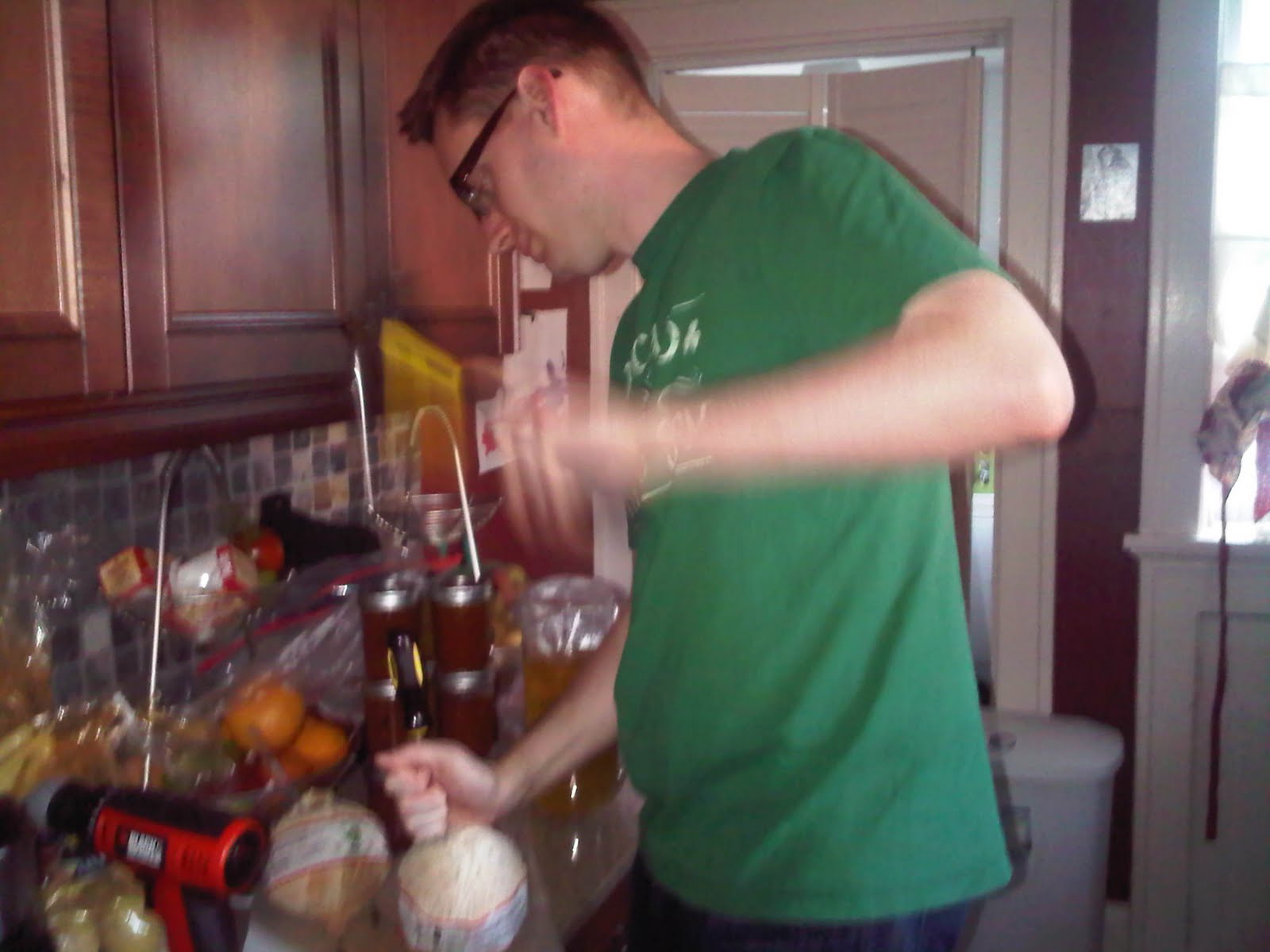 Opening coconut with hammer and screwdriver