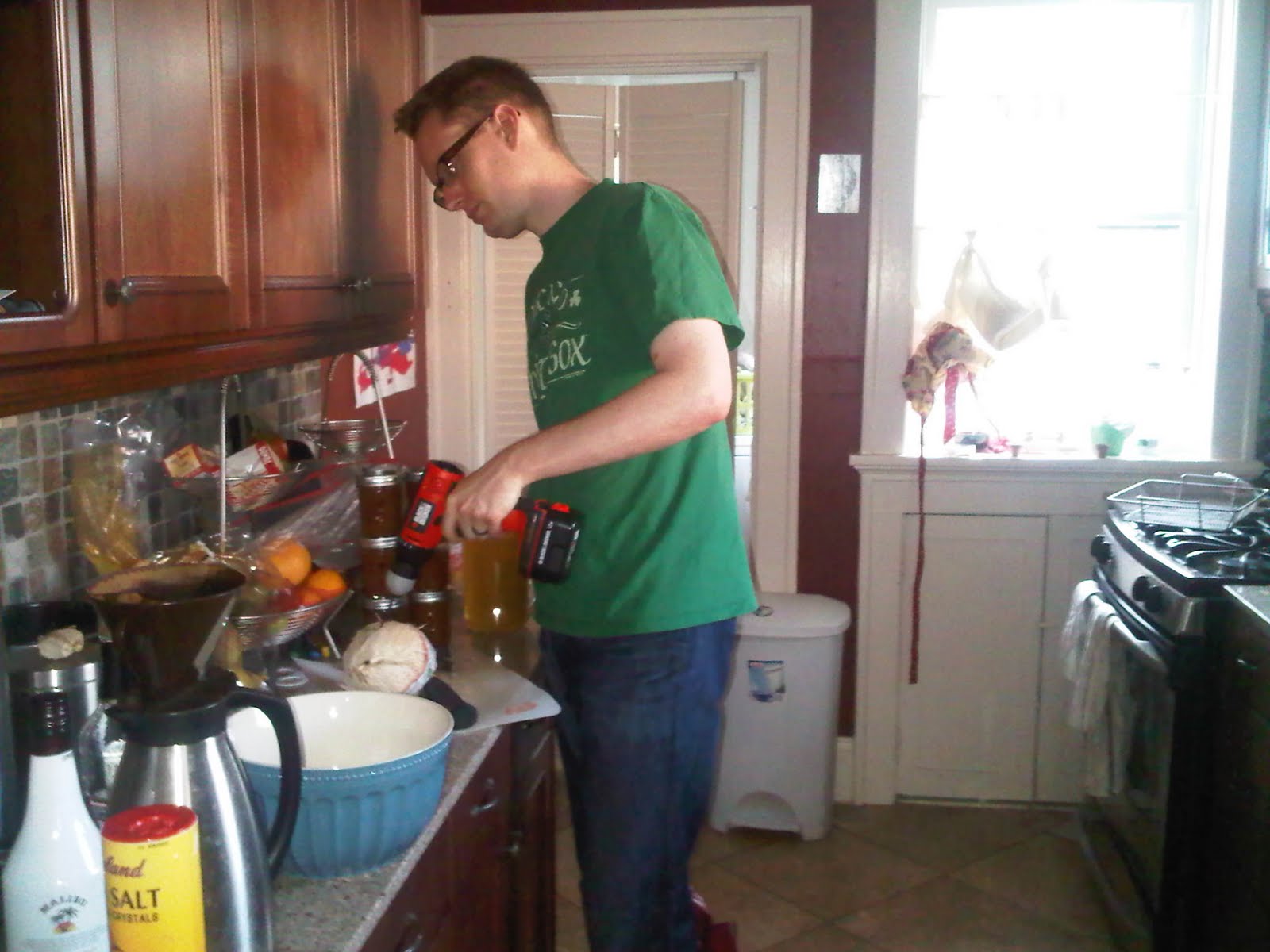 Trying to drill open coconut