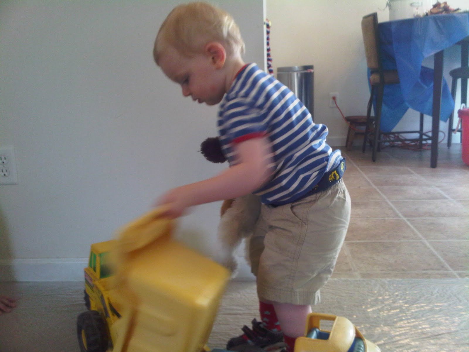 Playing with trucks at Abby's