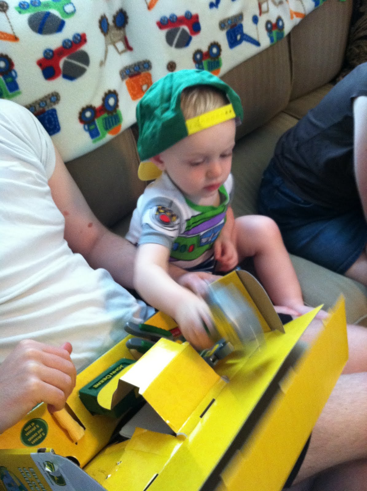 John Deere tool belt and hat from Simren. Andy knew the name of each of the tools and immediately started fixing the fireplace!