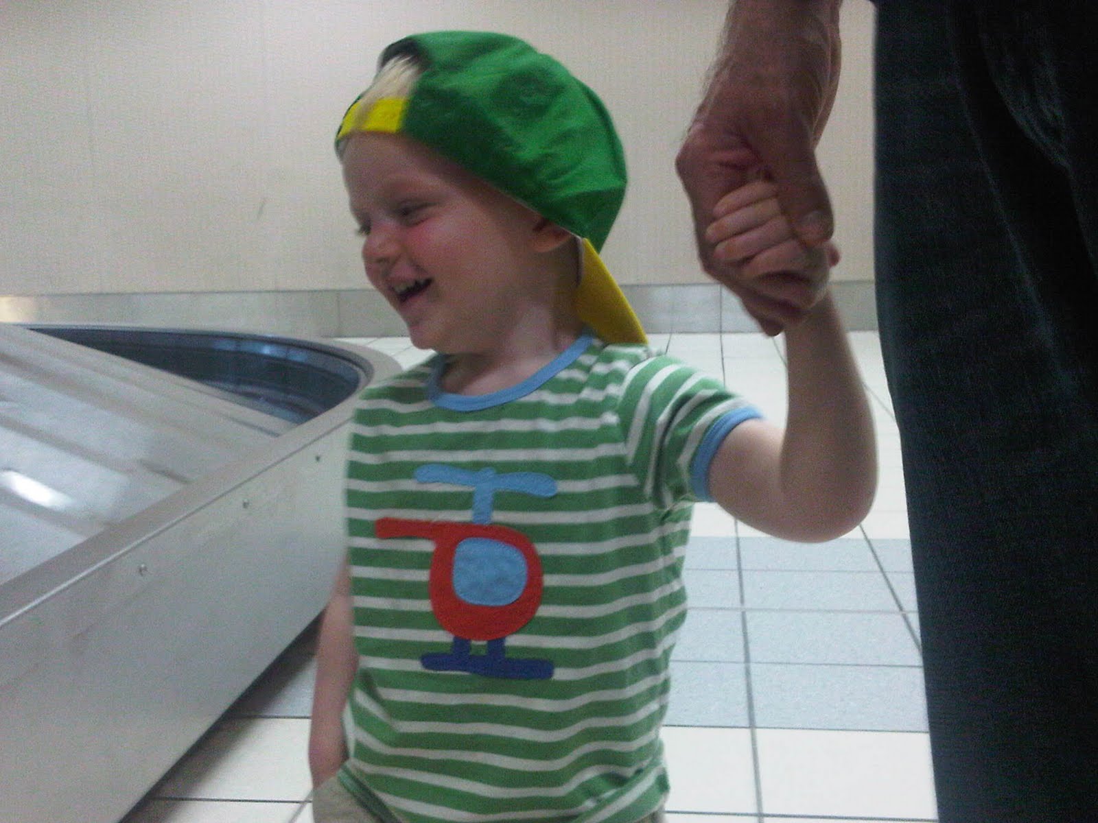 Happy boy in John Deere hat from Simren!