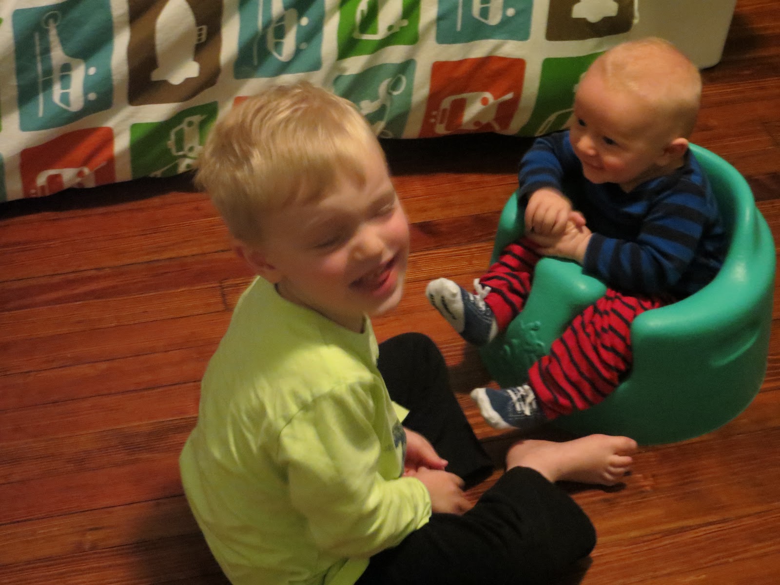 Charlie sat in the bumbo for the first time last night