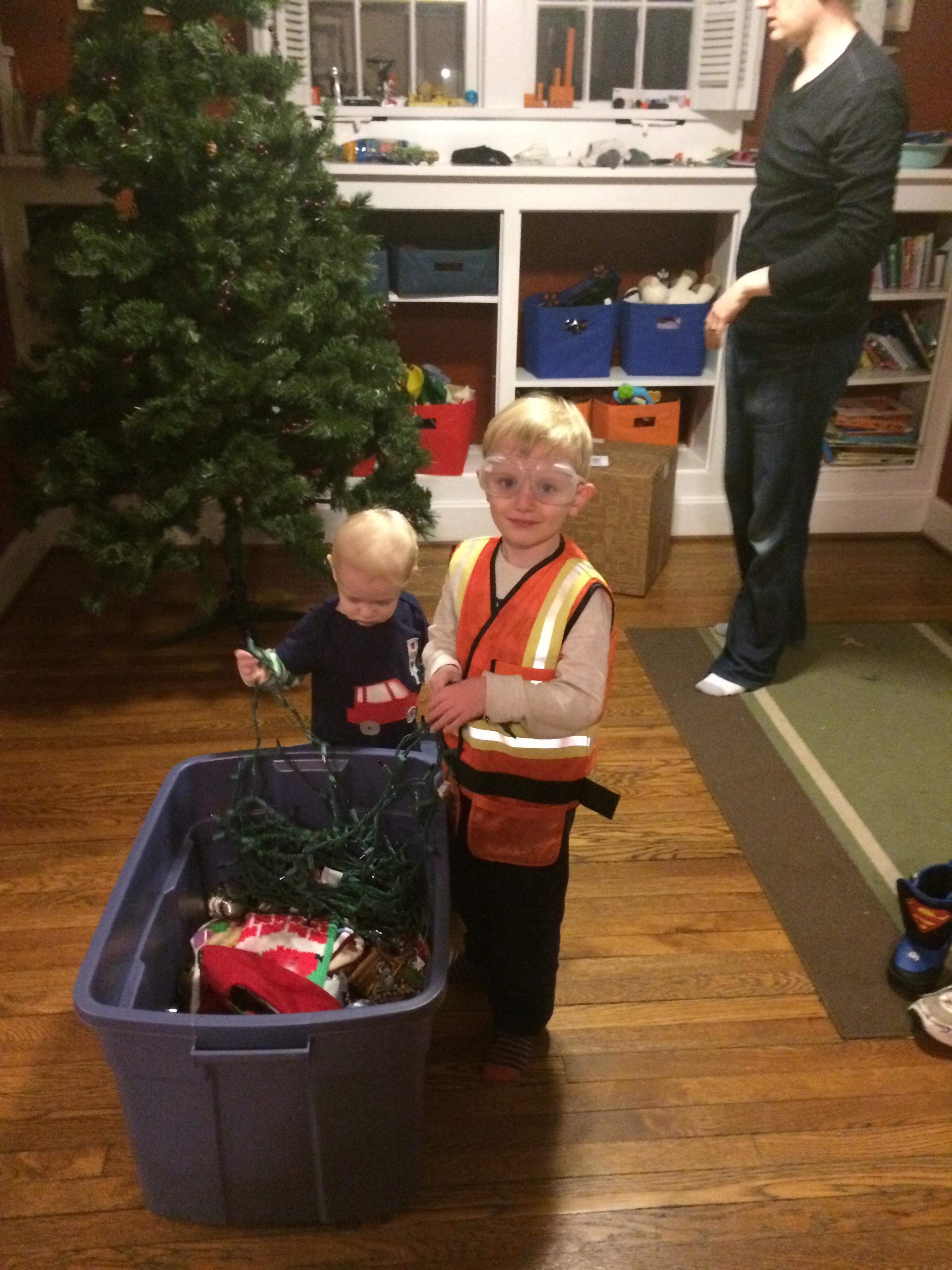 The safety officer puts up a Christmas tree
