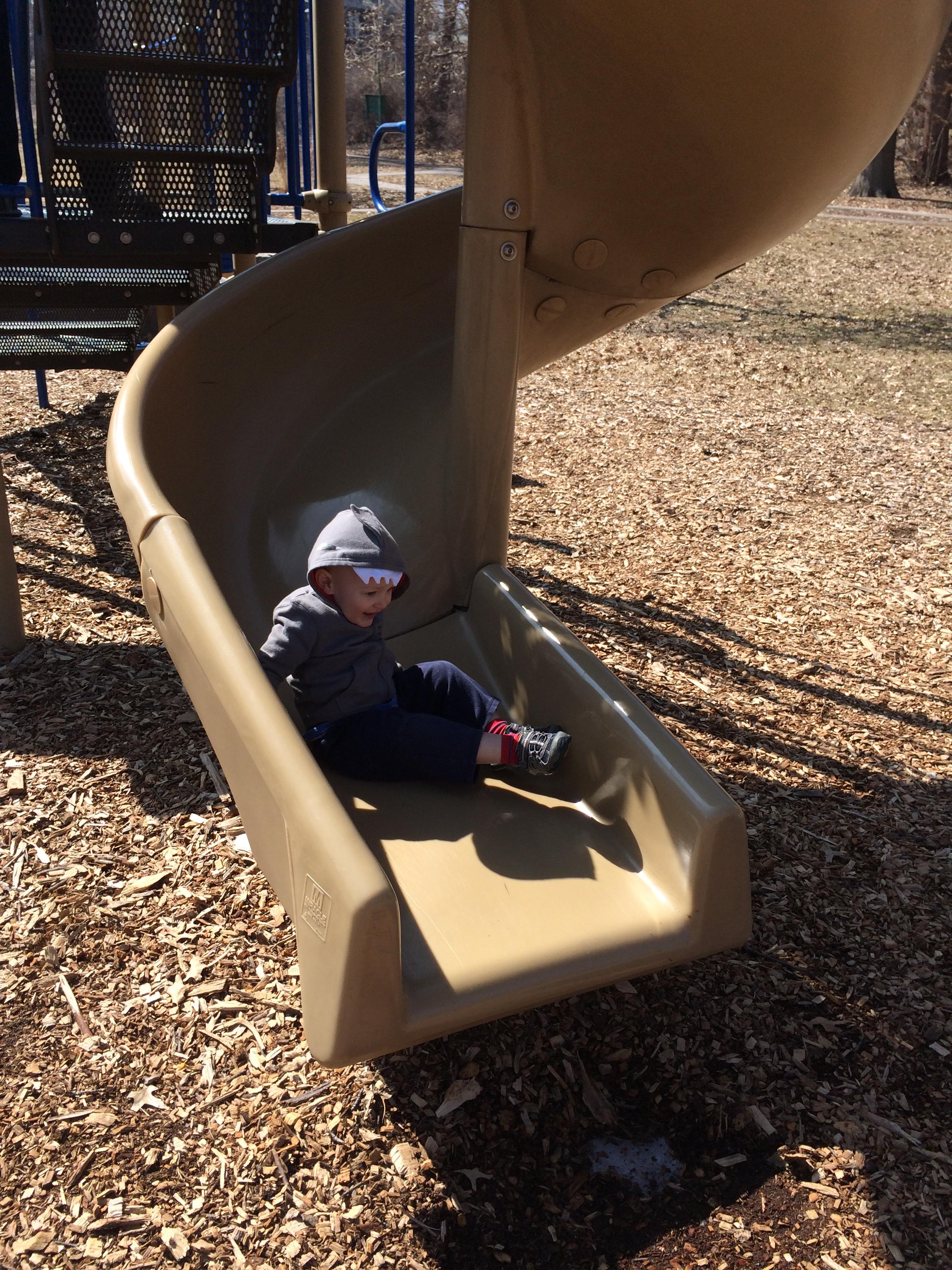 Charlie goes down the slides