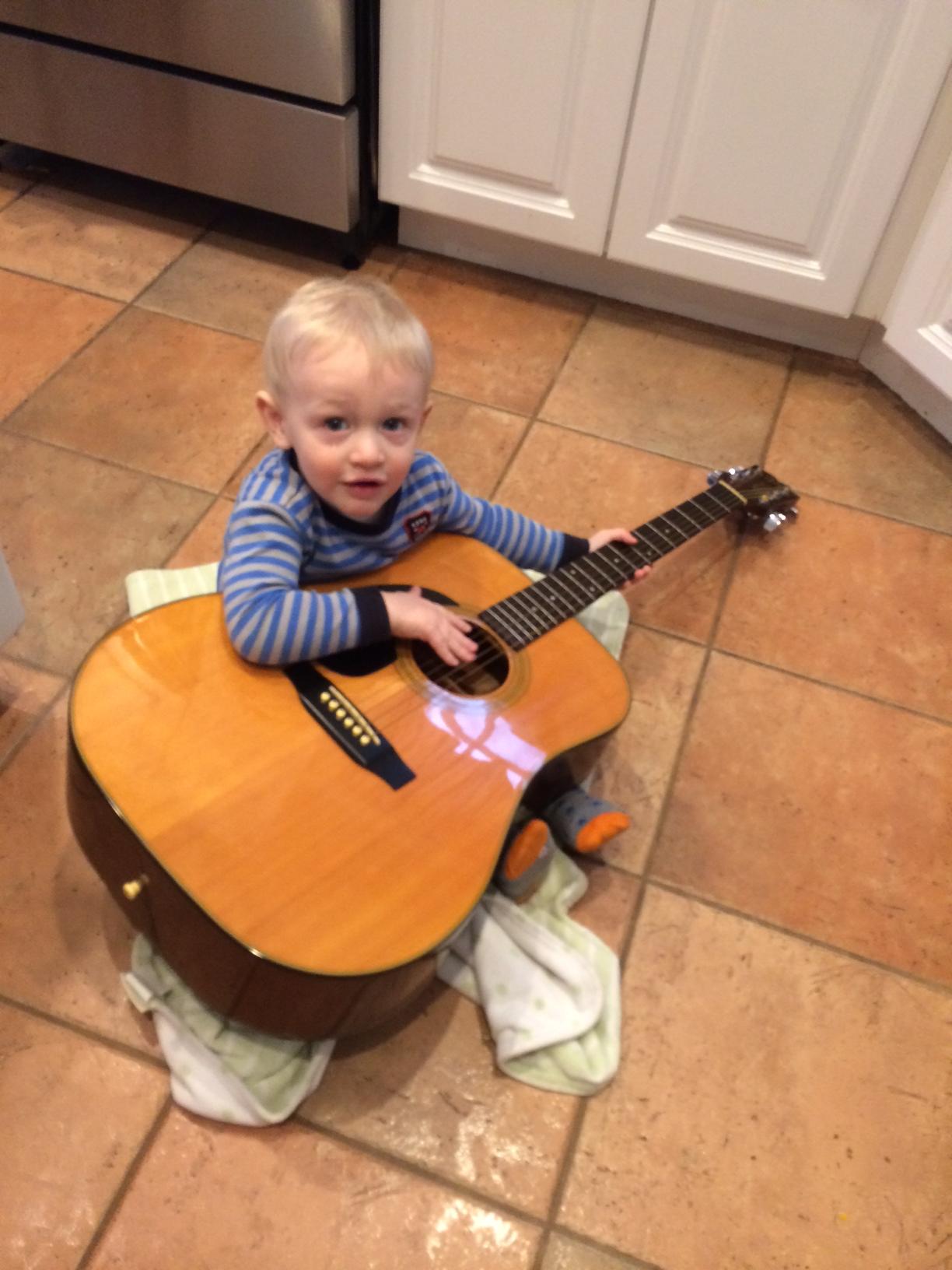 First time playing daddy's guitar