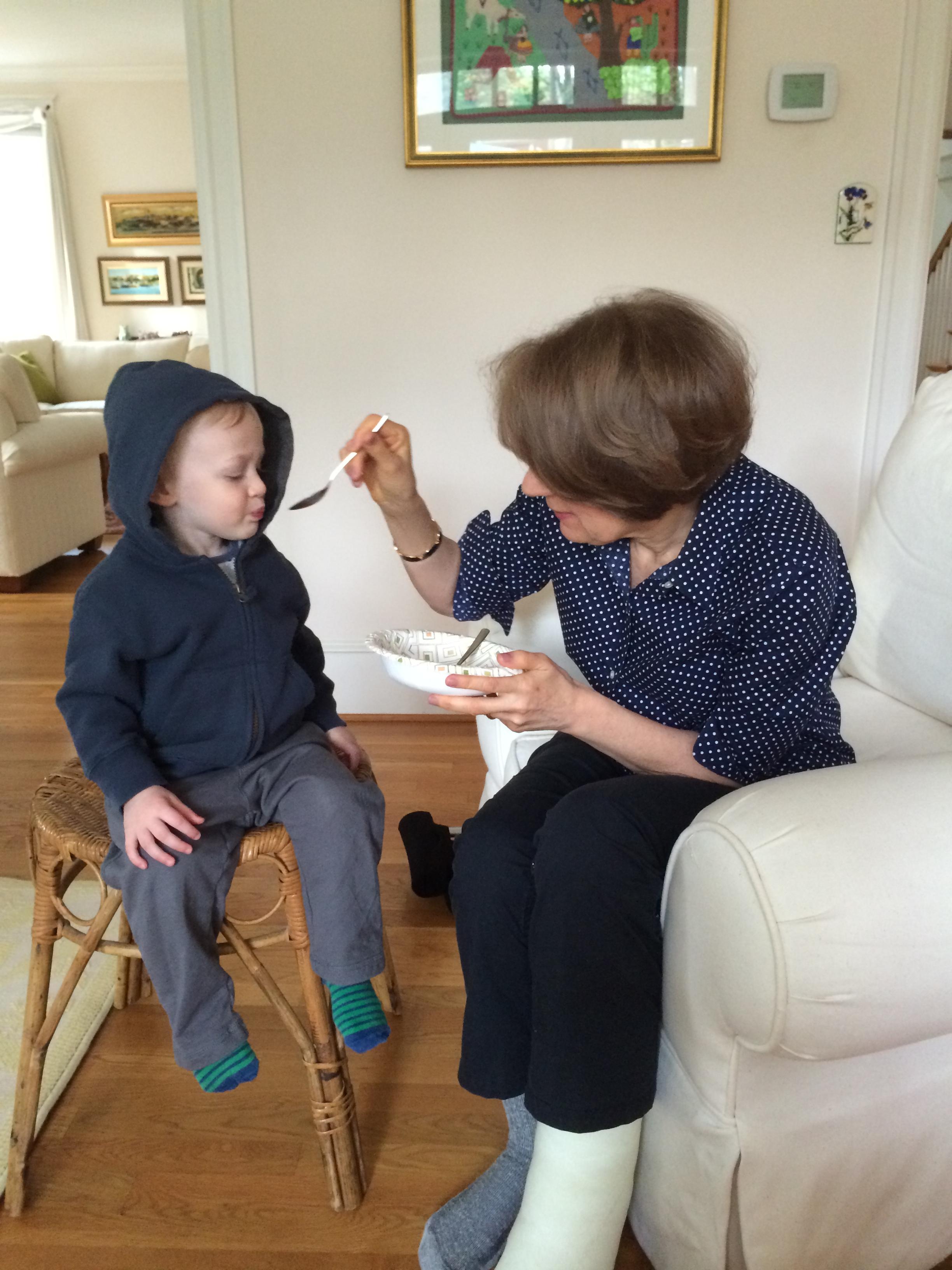 Being fed oatmeal by Momo