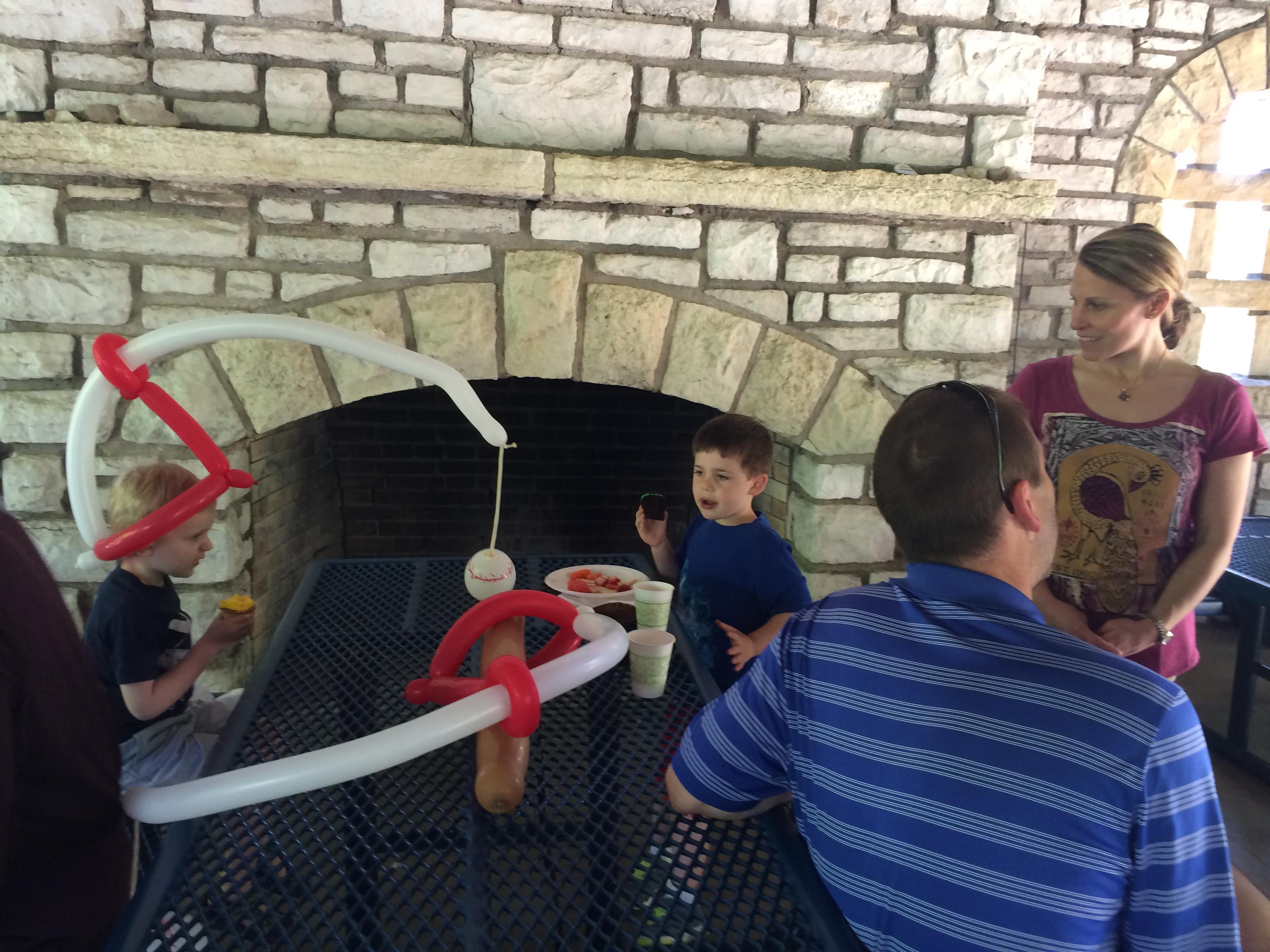 Baseball balloons with ben at Wilson picnic