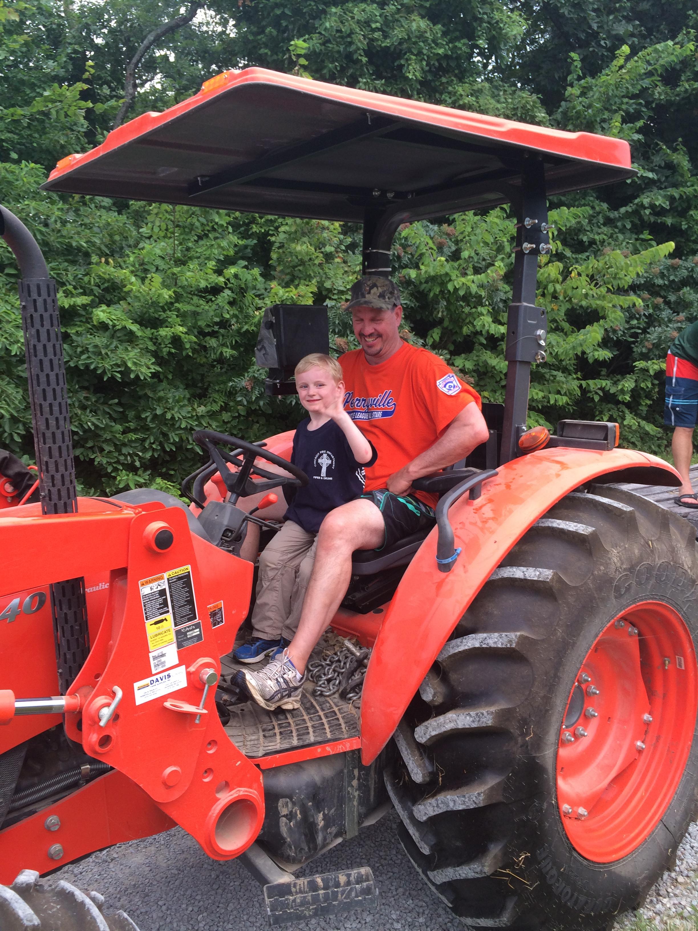 Andy drives the tractor
