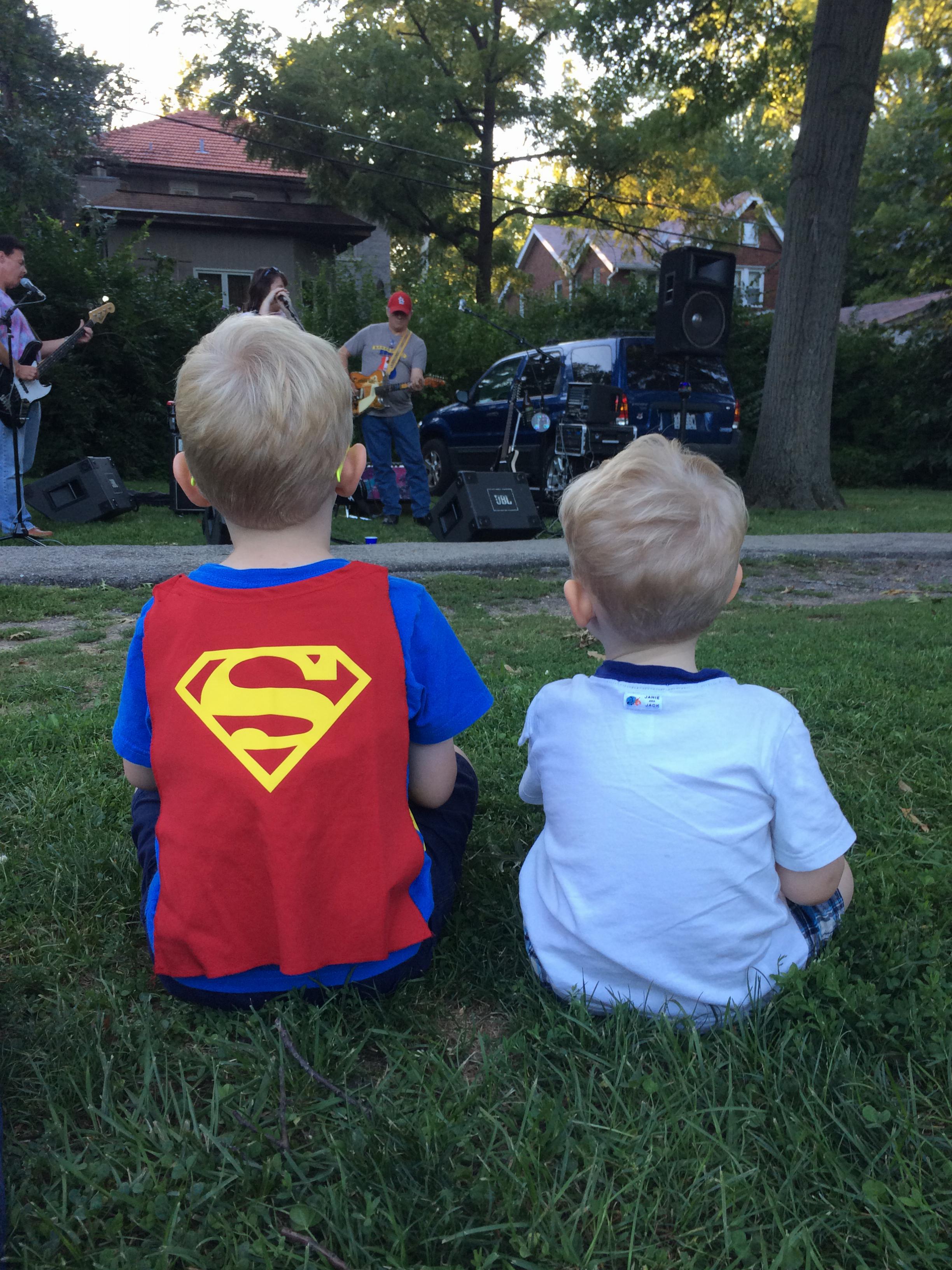 Listening to cosmic cowboys at annual neighborhood picnic