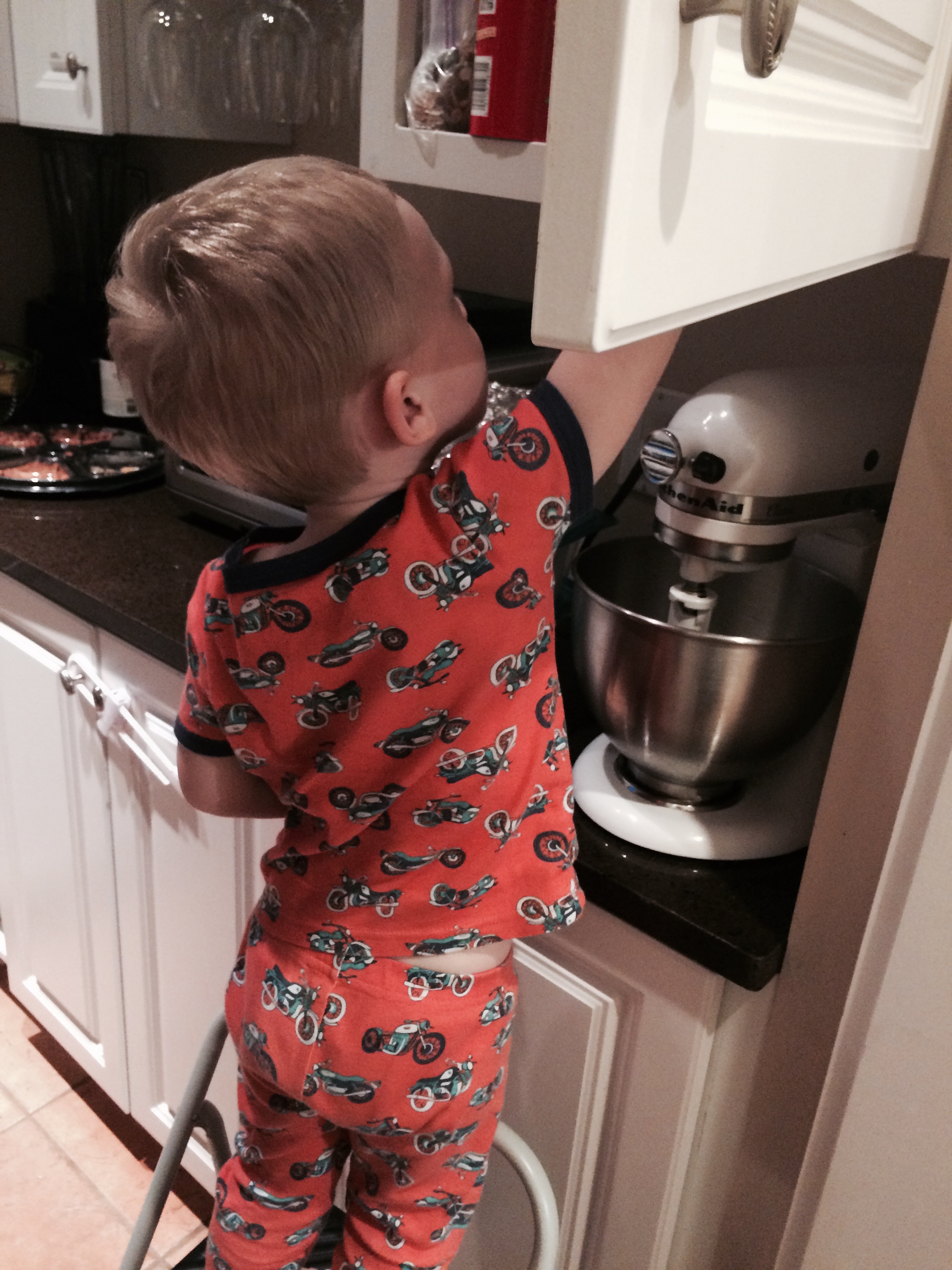 Charlie wanted dried mango from baba so he went upstairs to get the step stool and then got them himself !
