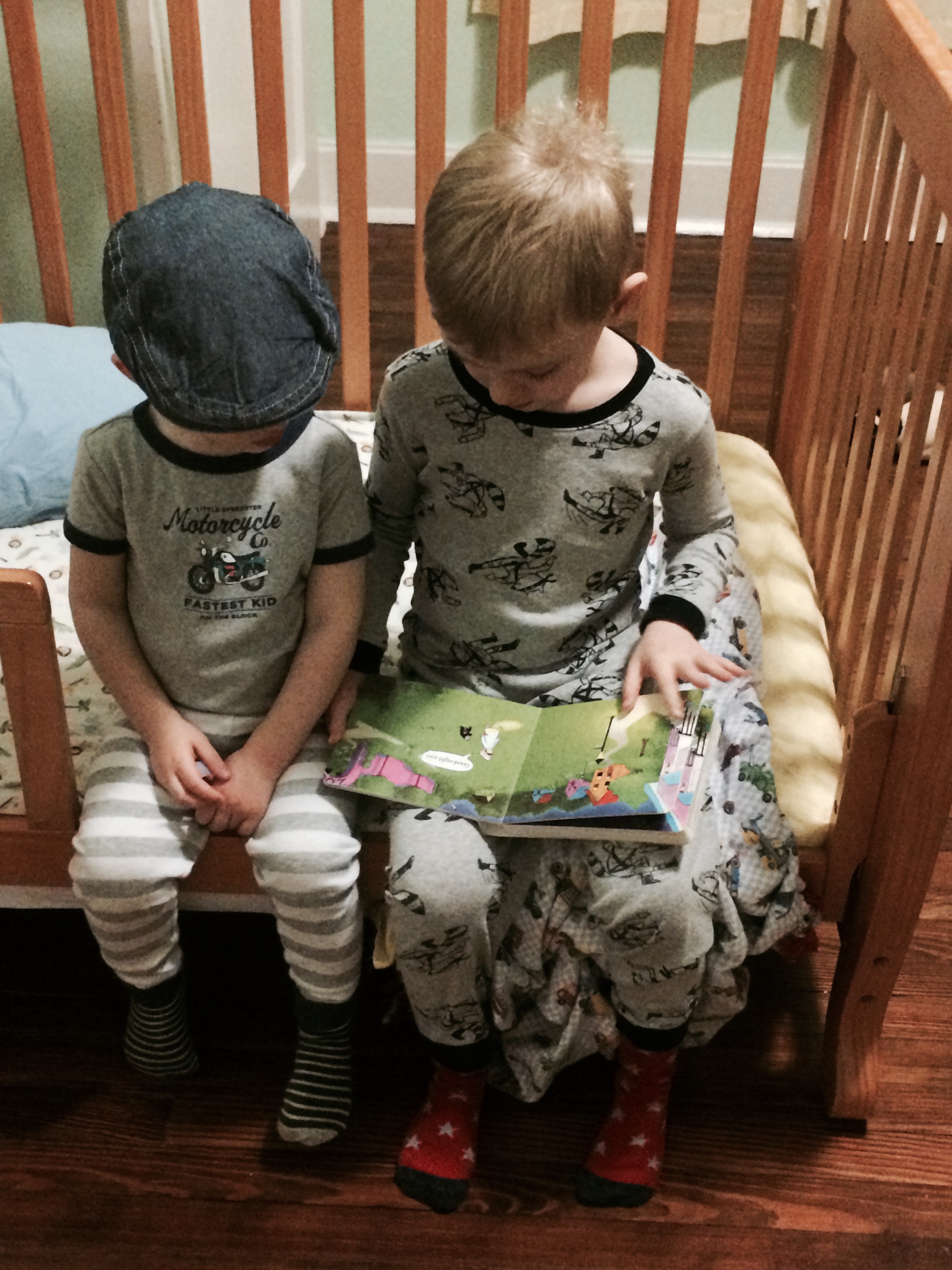 Andy reading goodnight gorilla to Charlie