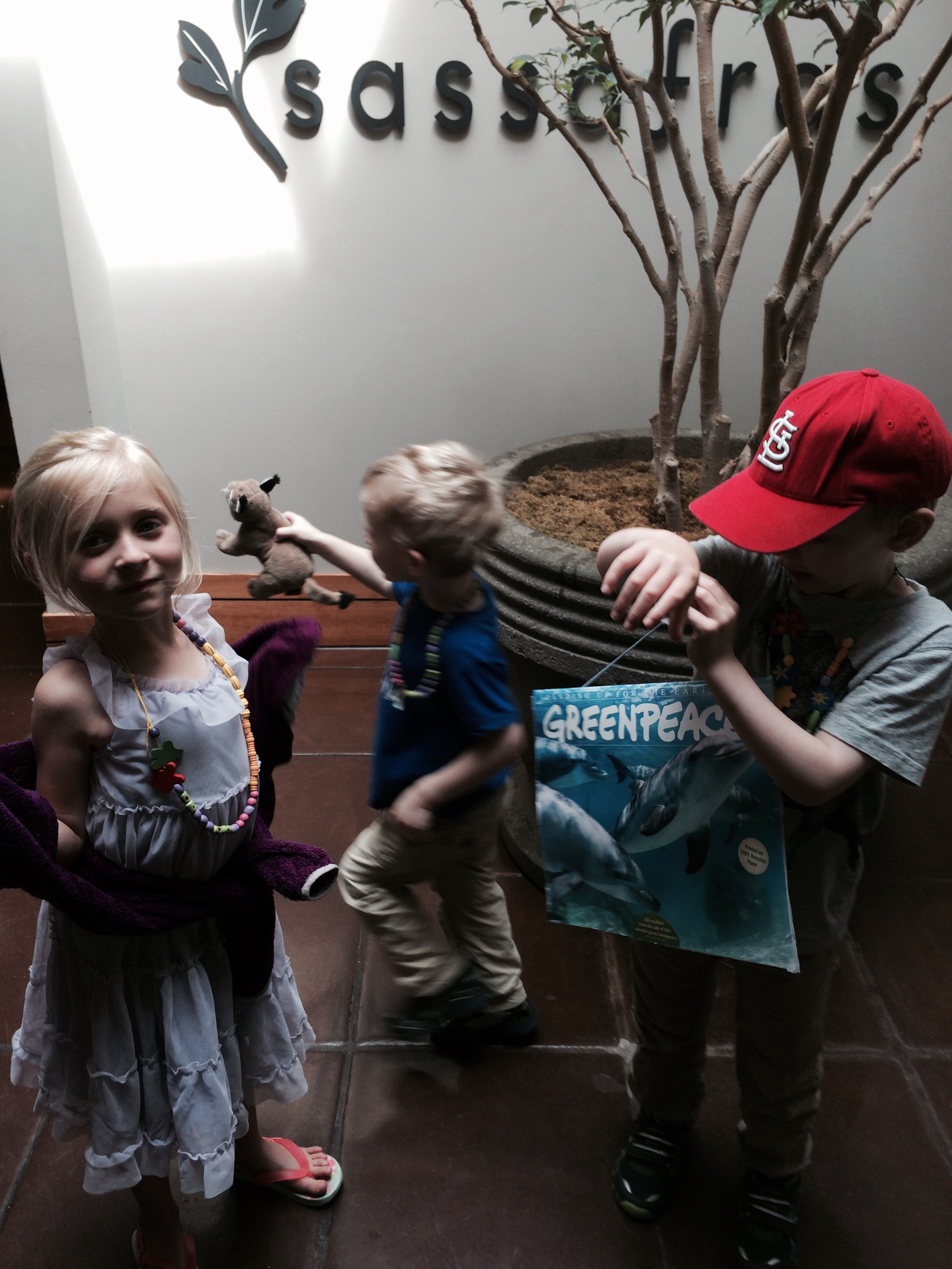 Andy showing Ava his dolphin calendar