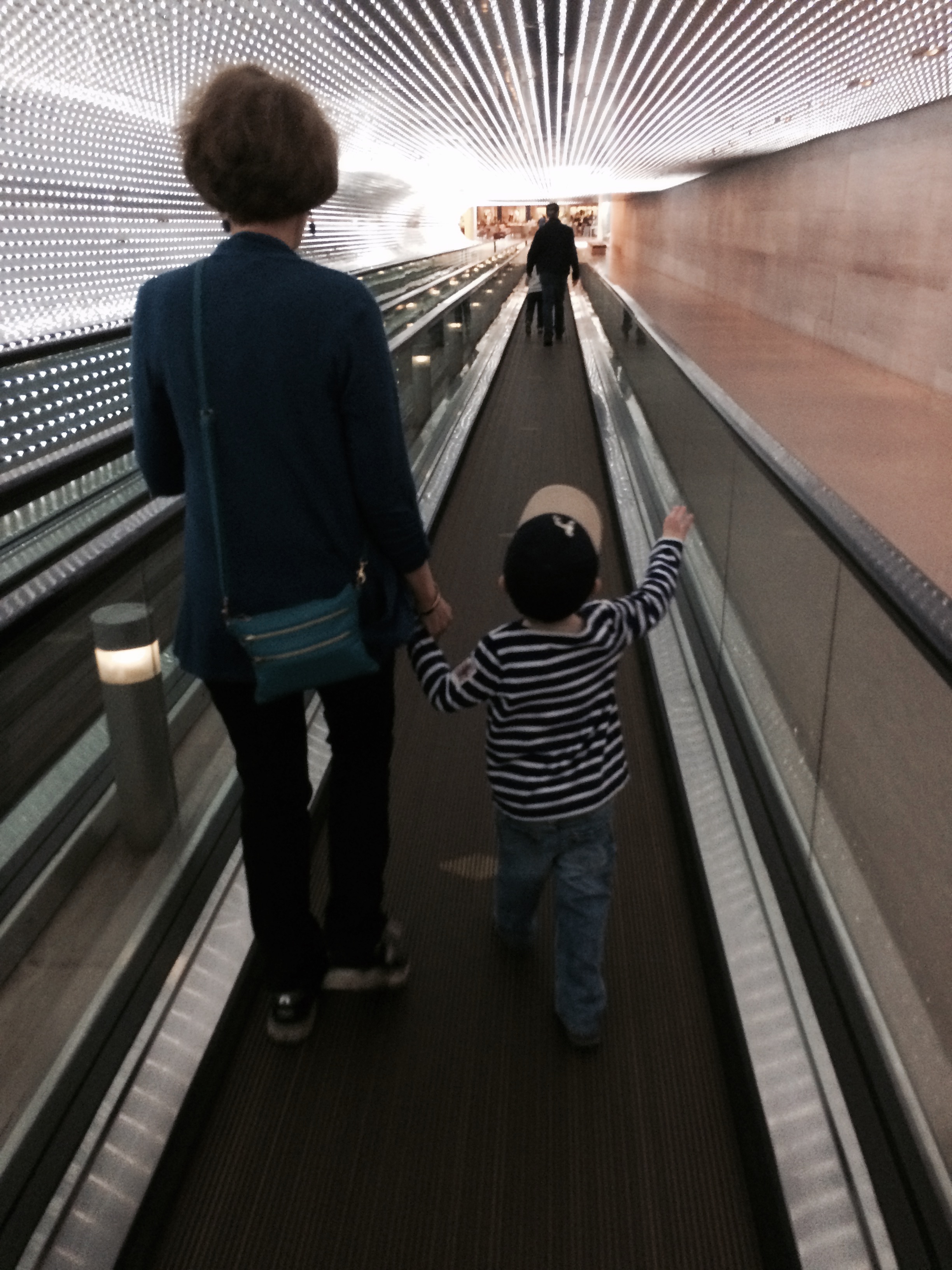 Moving walkway between east and west wing