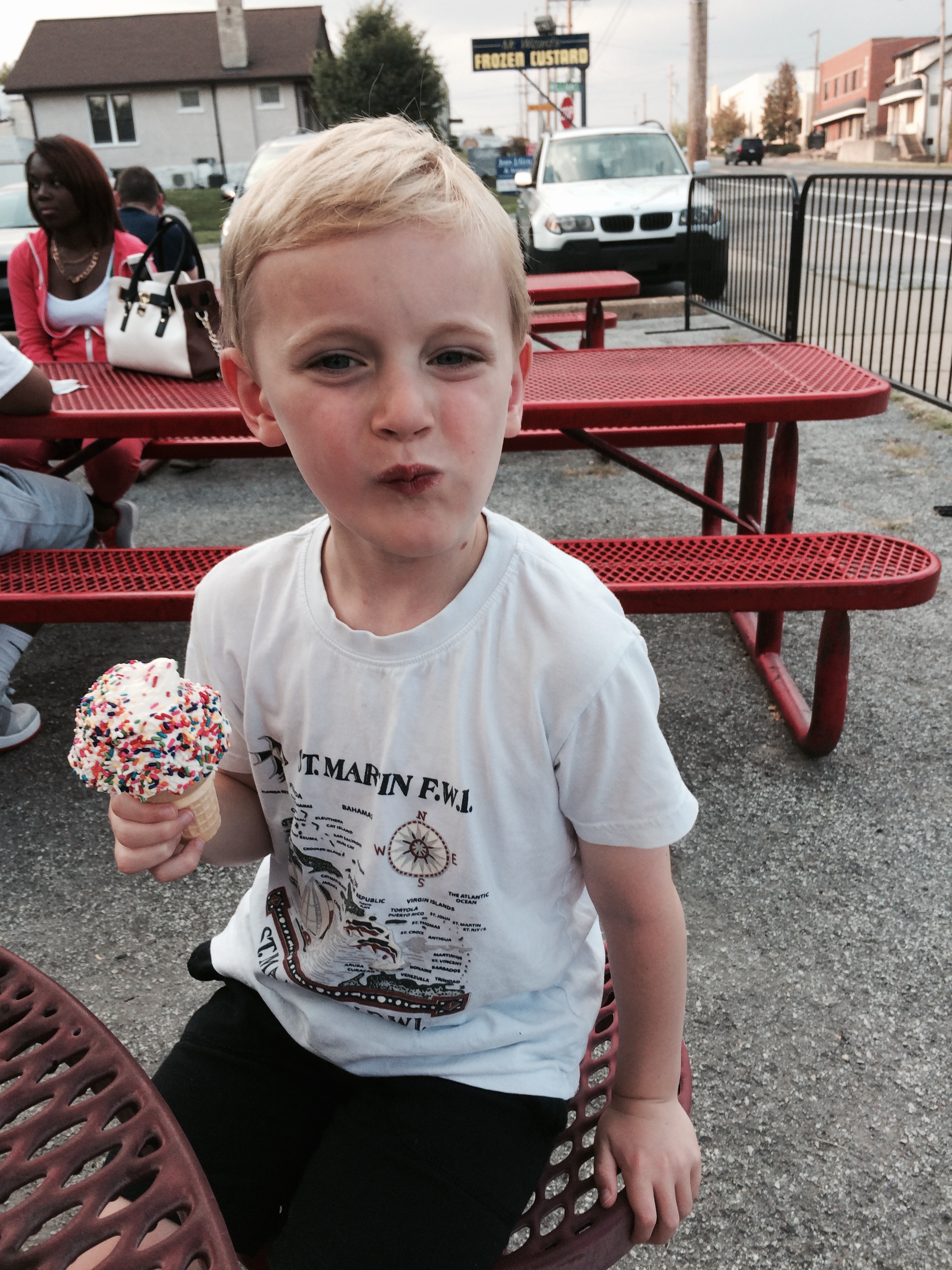 Before Charlie's second bite after his entire cone fell on the ground!