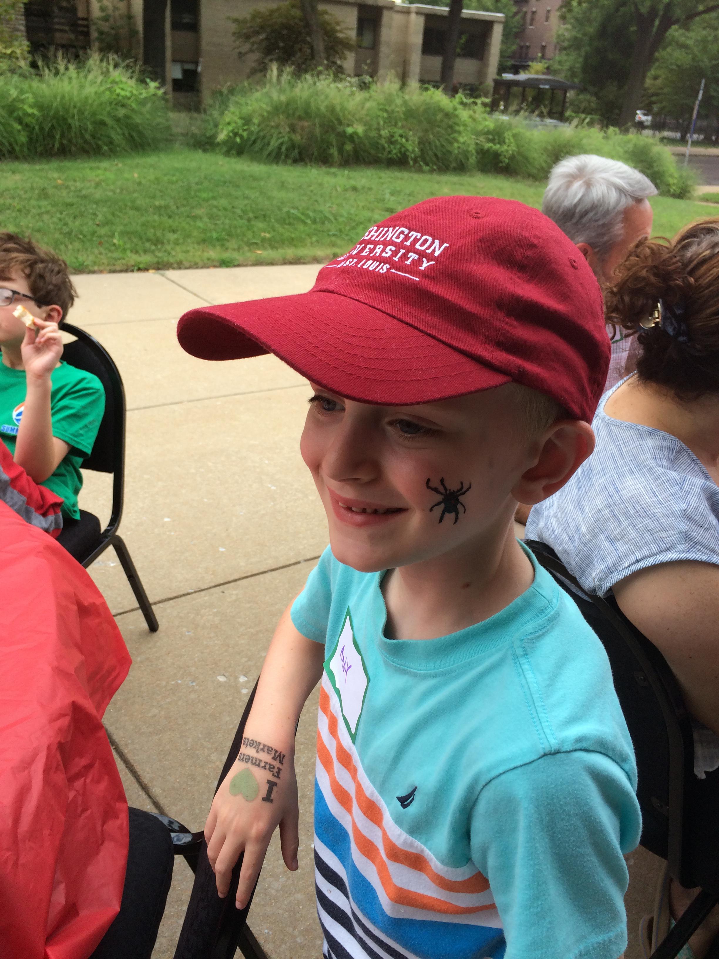 Face painting pizza and watermelon at Crc