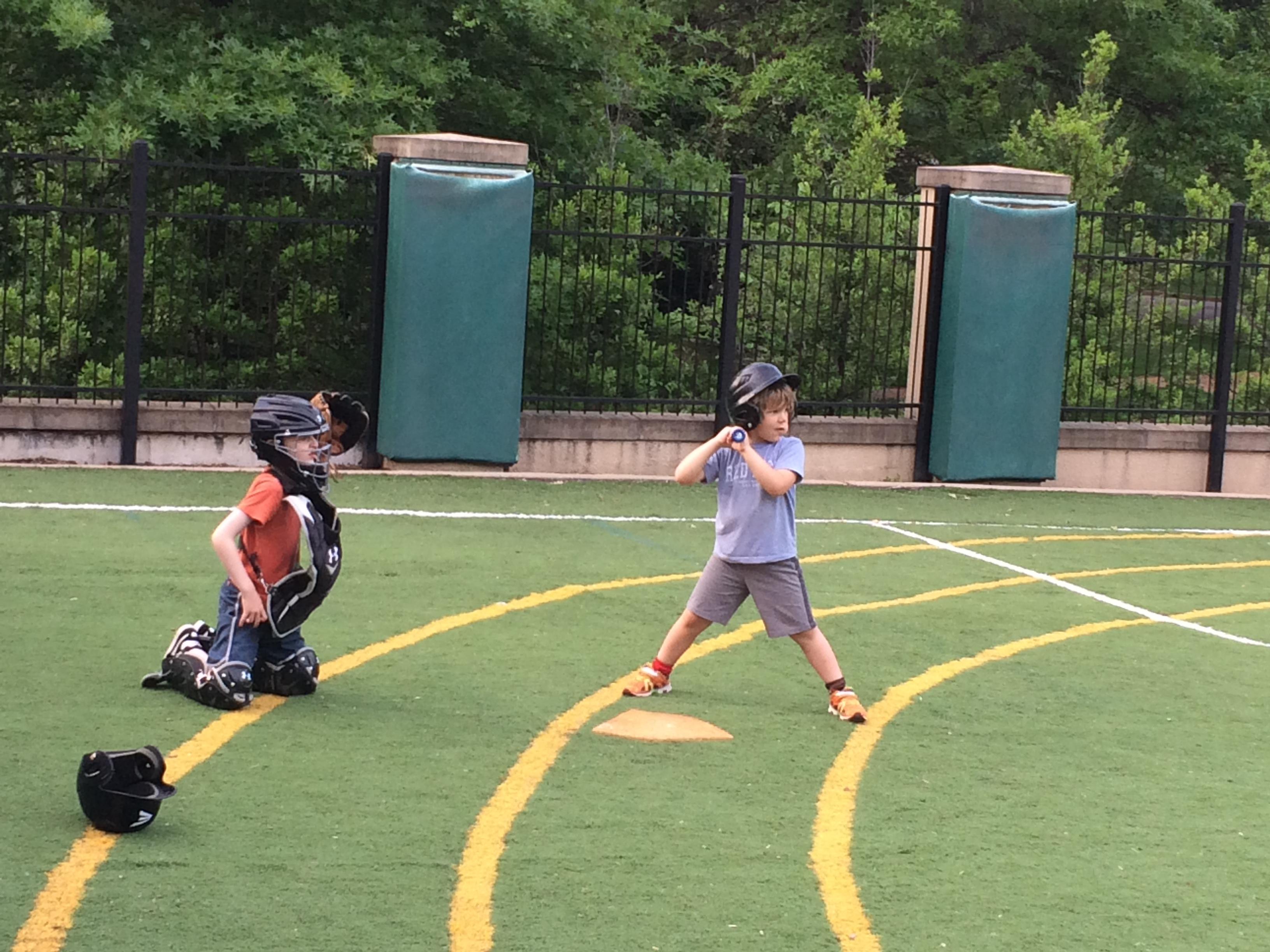 Catcher at first baseball practice
