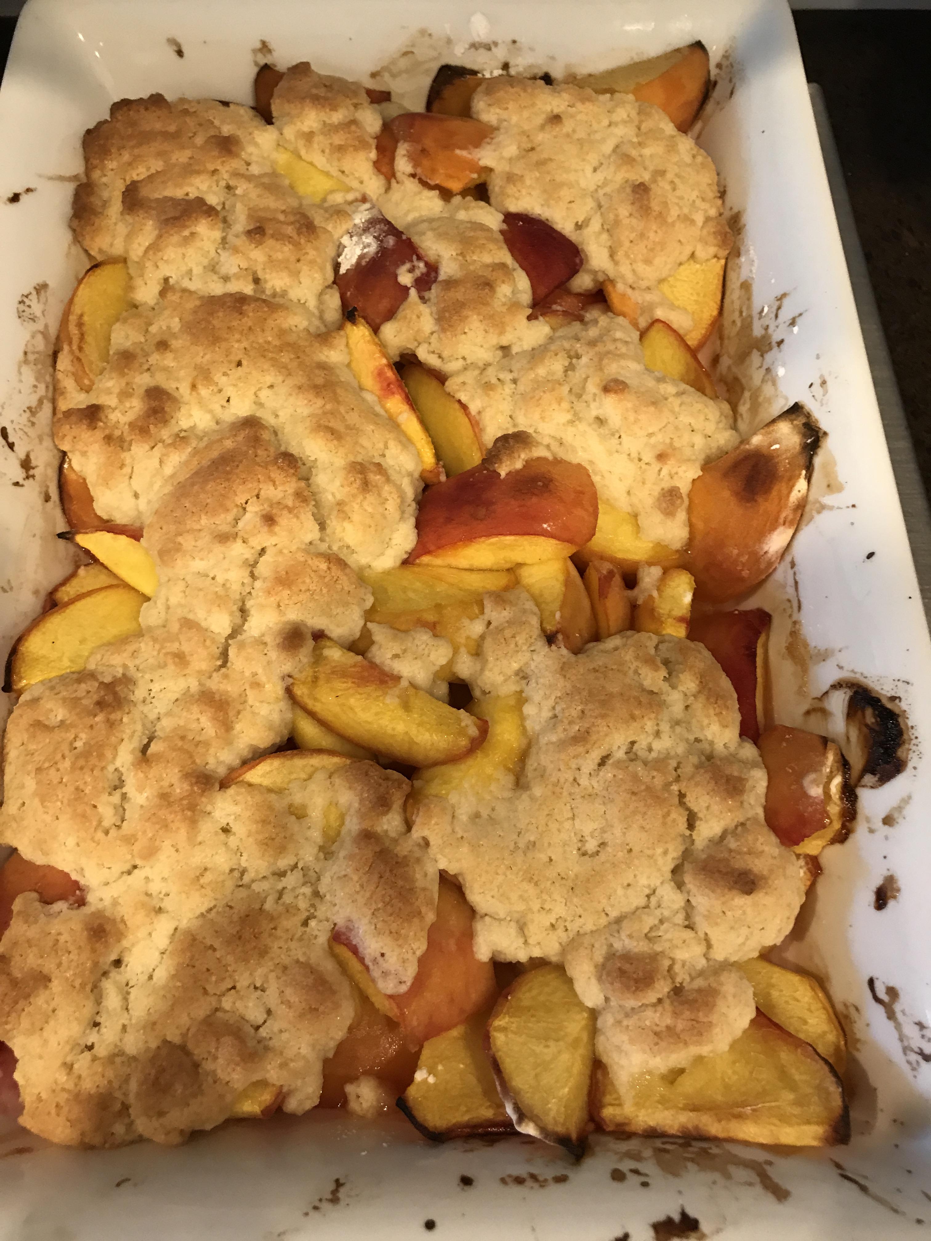 Baking with Hand picked peaches and blackberries