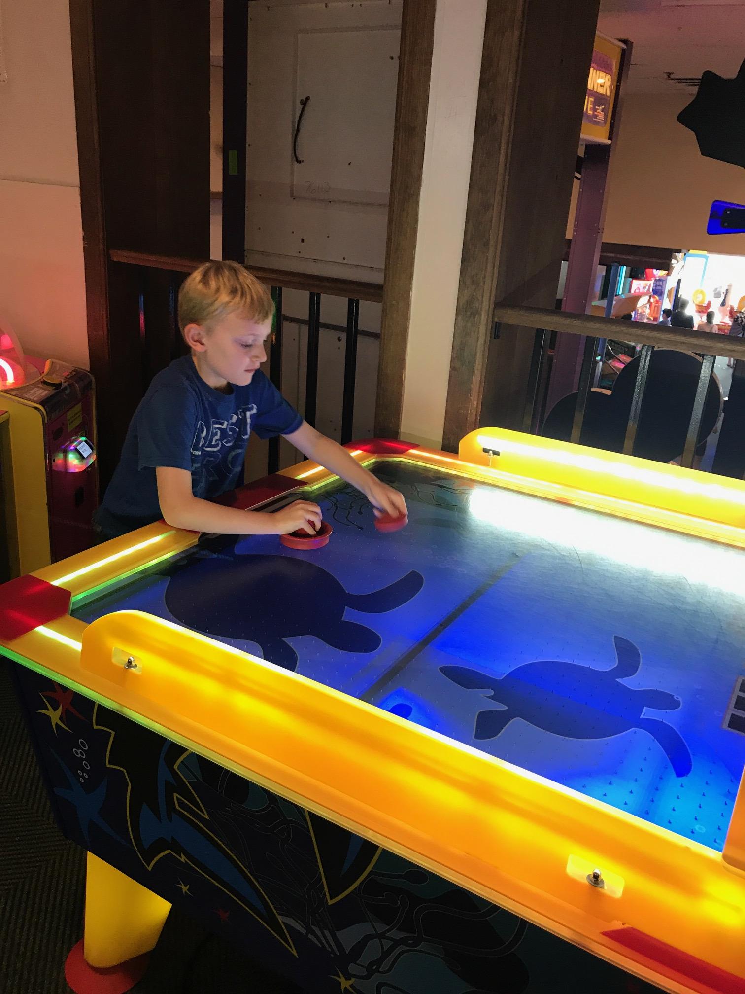 Air hockey at Newport arcade